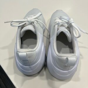 Women's White Athletic Shoes size 7. Worn in house one time, too big.